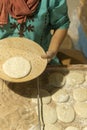 Woman bakes fresh cakes. vertical photo