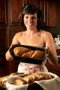 Woman baking bread Royalty Free Stock Photo