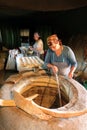 Woman baking traditional Georgian bread Royalty Free Stock Photo