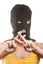 Woman in balaclava showing prison gesture Royalty Free Stock Photo