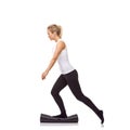 Woman, balance and mat in studio for fitness, pilates or workout for healthy body, wellness or exercise. Person, socks