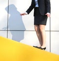 Woman Balances On A Wall