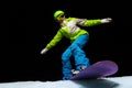 Woman balancing with hands on snowboard Royalty Free Stock Photo