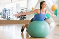 Woman Balancing On Swiss Ball