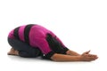 Woman in Balasana yoga pose