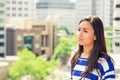 Woman on the balcony enjoying city view relaxing