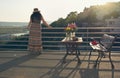 Woman at Balcony in Sunset