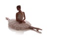 Woman ballerina in white pack tutu posing on white background