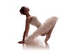 Woman ballerina in white pack tutu posing on white background