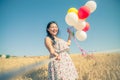 Woman with balloons