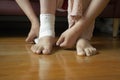 Woman with bandaged foot close up