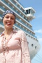 Woman in bandana standing, big cruise l Royalty Free Stock Photo