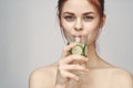 woman with bare shoulders cucumber health drink Fresh