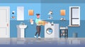 Woman with basket of clothes standing near washing machine housewife doing housework modern bathroom interior cartoon Royalty Free Stock Photo