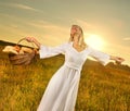 Woman with a basket full of bread