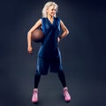 Woman basketballer in blue jersey Royalty Free Stock Photo