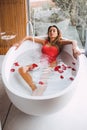 Woman in a modern bath tub Royalty Free Stock Photo