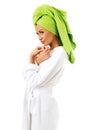 Woman in bathrobe and towel on head Royalty Free Stock Photo