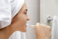 Woman during her daily tooth brushing routine Royalty Free Stock Photo