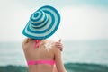 Woman on beach applying sun block creme Royalty Free Stock Photo