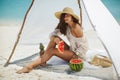 Woman on the Beach Eating Watermelon Royalty Free Stock Photo