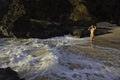 Woman on beach at sunrise Royalty Free Stock Photo