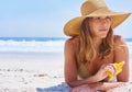 Woman, beach and sunscreen while on a tropical vacation in Bali for rest and relaxation. Skincare, protection and Royalty Free Stock Photo