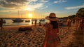 woman on beach at sunset sea,people relax ,yacht boat on sea water, Royalty Free Stock Photo