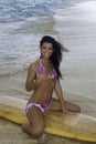 Woman on the beach with surfboard Royalty Free Stock Photo