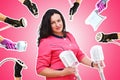 A woman beautician against the background of a collage of handpieces for carrying out hardware slimming procedures in a spa salon. Royalty Free Stock Photo