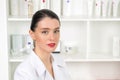 Woman beautician doctor at work in spa center. Portrait of a young female professional cosmetologist. Female employee in Royalty Free Stock Photo