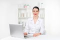 Woman beautician doctor at work in spa center. Portrait of a young female professional cosmetologist. Female employee in Royalty Free Stock Photo