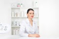 Woman beautician doctor at work in spa center. Portrait of a young female professional cosmetologist. Female employee in Royalty Free Stock Photo