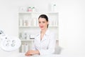 Woman beautician doctor at work in spa center. Portrait of a young female professional cosmetologist. Female employee in Royalty Free Stock Photo