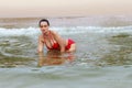 Woman beautiful breast happy with red bikini