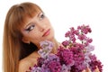 Woman beautiful face with flower lilac isolated
