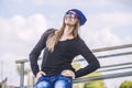 Woman beautiful model in hat and sunglasses in the city Royalty Free Stock Photo