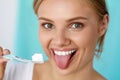 Woman With Beautiful Smile, Healthy White Teeth With Toothbrush Royalty Free Stock Photo