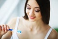 Woman With Beautiful Smile, Healthy White Teeth With Toothbrush. Royalty Free Stock Photo