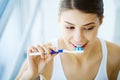 Woman With Beautiful Smile, Healthy White Teeth With Toothbrush. Royalty Free Stock Photo