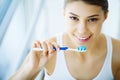 Woman With Beautiful Smile, Healthy White Teeth With Toothbrush. Royalty Free Stock Photo