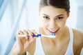 Woman With Beautiful Smile, Healthy White Teeth With Toothbrush. Royalty Free Stock Photo