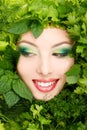 Woman beauty face with greens vegetables frame Royalty Free Stock Photo