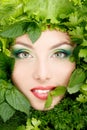 Woman beauty face with greens vegetables frame Royalty Free Stock Photo