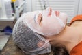A woman in a beauty salon during a facial skin care treatment Royalty Free Stock Photo