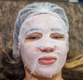 A woman in a beauty salon during a facial skin care treatment Royalty Free Stock Photo