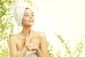 Woman Beauty Skin Care, Model Applying Moisturizer to Neck Royalty Free Stock Photo