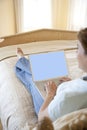 Woman on Bed With Keyboard