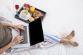 Woman bed laptop breakfast Royalty Free Stock Photo