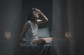 Woman in bedroom suffering during a heatwave Royalty Free Stock Photo